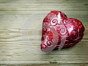 Heart candles love valentine`s day on wooden background