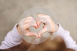 Heart from children& x27;s hands