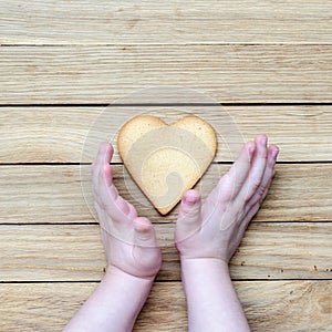 Heart in the children's hands