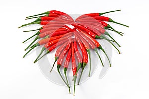 Heart of chili pepper on white background