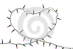 Heart with christmas lights on white background