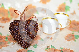 Heart of coffee beans and coffee cups (Valentine. Valentine's Da