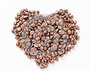 Heart coffee beans isolated white background.
