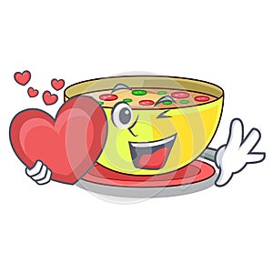 With heart corn chowder in the mascot shape