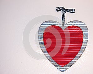 Heart decoration hanging on a wall.