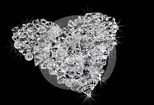 Heart of diamonds on black photo