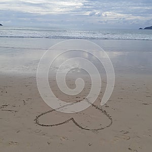 Heart drawing on the beach