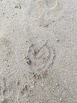 Heart drawing in beach sandHeart drawing in beach sand