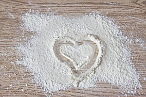 Heart drawn on flour