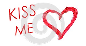 Heart drawn with red lipstick and phrase Kiss Me on white background