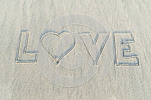 Heart drawn on sand