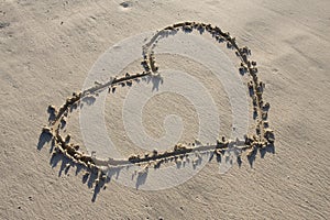 A heart drawn in the sand