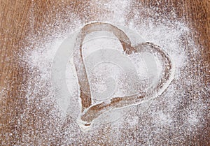 Heart of flour on old boards