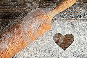 Heart, flour and rolling pin