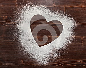 The heart of the flour on the table from the old boards