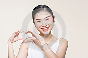 Heart With Hands. Happy Woman Showing Love Sign With Hands