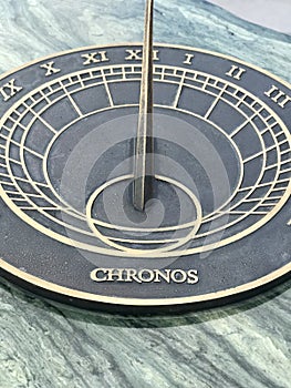 Black & Gold Chronos Sundial - A Timeless Marker in Hel, Poland photo