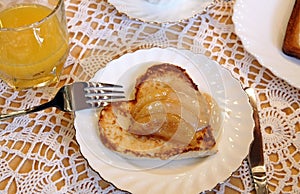 Heart-like toast with apple sauce