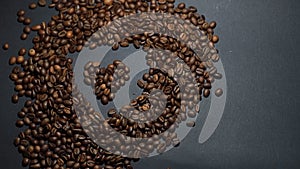 heart made of coffee beans on the table. coffee love concept