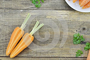 Heart made of double cut carrot on wooden table