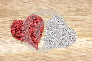 Heart made of dried goji berries and chia seeds
