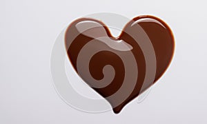 heart made of melted chocolate. Conceptual idea for Valentine\'s Day. A sweet love