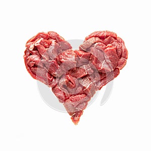 the heart is made from raw meat isolate. beef in the shape of a heart, symbolizes heart disease, overeating, cooking or