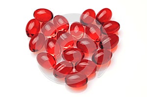 Heart made of red capsules