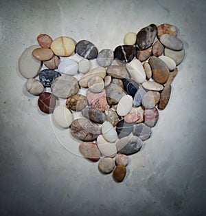 Heart made of sea stones. Valentine`s Day
