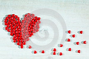 A heart made â€‹â€‹up of little heart-shaped candies