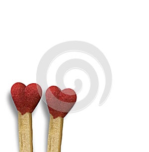 Heart matches near to each other love amor valentines day background isolated photo