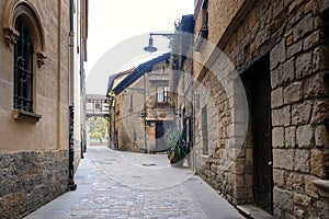 In the heart of Medieval Pamplona Redin street leading to the Caballo Blanco square photo