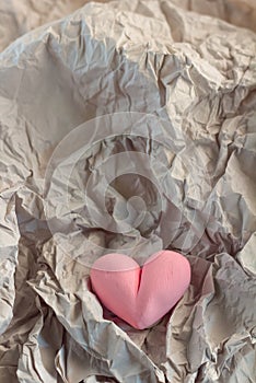 Heart objcet with crump paper background