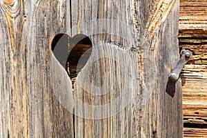 heart and old brown rustic dark grunge wooden texture - wood Background banner.