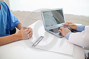 A heart patient visits a doctor for advice on health care and medication to treat heart disease symptoms after the medical team