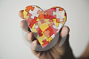 Heart patterned with puzzle pieces, for the autism