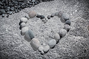 Heart Of Pebble On A rock