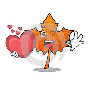 With heart red maple leaf mascot cartoon