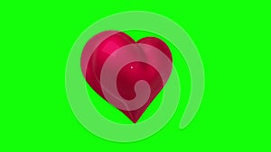 Heart revolving on green background