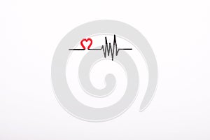 Heart rhythm hand drawing, electrocardiogram, heart beat pulse line concept on white paper