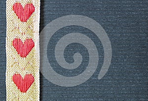 Heart ribbon on the grey background.