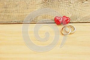 Heart and ring On wooden retro