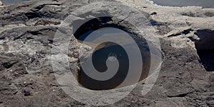 The heart of rock with moon reflection photo