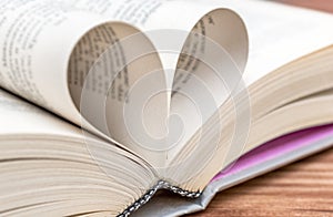 Heart shape from book pages. Close up