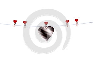 Heart shape brown paper frame hang on wood clothes red clip  and white string line isolated on white background , clipping path