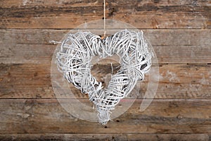 Heart Shape Christmas Wreath White Twigs on Old Rustic Background