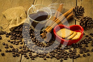 Heart shape cup, Bread in Red Heart and Coffee beans on wooden