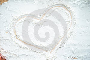 Heart shape drawn on flour