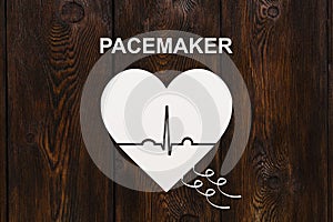 Heart shape with echocardiogram and PACEMAKER text. Cardiology concept