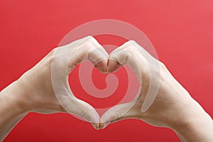 Heart shape with hands photo